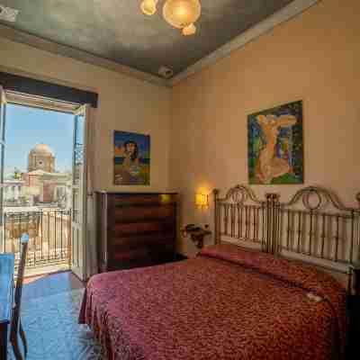 Hotel Henry's House Rooms