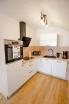 Modern and bright vacation apartment with Hutewald view