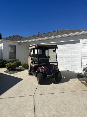 WOW CLOSED IN COURTYARD VILLA, GOLF CART, 2 BEDROOMS AND WALK TO 5 LOCAL POOLS.