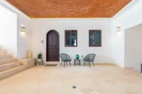 Brand New 12 Suite Villa  directly on the waters edge of the Caribbean Sea