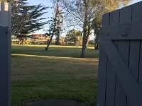 A modern house close to town and the beach and backs on to a tree lined park