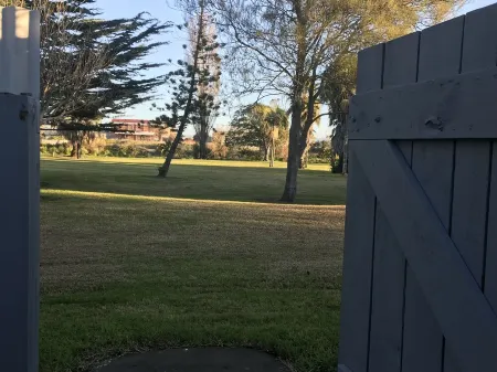 A modern house close to town and the beach and backs on to a tree lined park