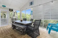 "The Palms" is nestled on a secluded half acre in the forest.  ThePalmsHouse.com