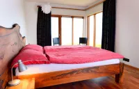 Spacious, luxurious house with a lot of natural wood