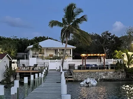 Waterfront Beach Bungalow with 150 Foot Dock on Guana Cay and Waterside Pergola
