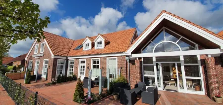 Friesischer Hof, Ferienwohnungen Mit Indoor Spielplatz, Kostenfreien Parkplatz Und W-Lan Отели в г. Рехтзупвег