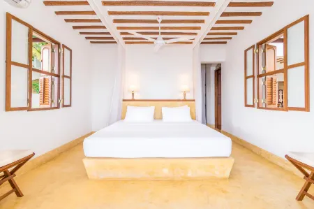 Cinnamon House by the Serendipity Collection