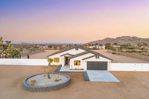 Bocce PoolSpa Game Room Firepit Modern Oasis Yucca Haven by AvantStay