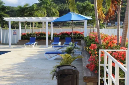 Cozy yet elegant Jamaican vacation home with access to pool, beach, gym etc