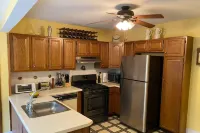 Spacious river front get-away with pool next door!