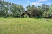 Lakeview Cabin > Unique Mid-Century Tucked in Bluff