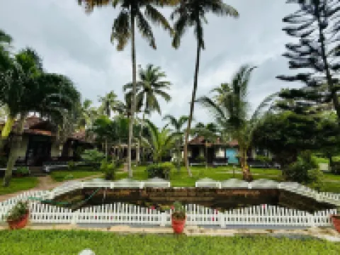 Maadathil Cottages - Apartments