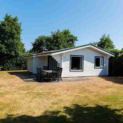 Wooden Bungalow with Dishwasher Near the Beach Hotel Exterior