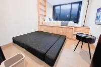 Modern and Bright Studio Apartment Collins Boulevard By Travelio