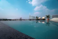 Aura Inn & Suites