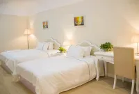 Tinghai Boutique Holiday Apartment (Qingdao Sunac Mao Branch) Hotels near Qingdao Oriental Movie Metropolis