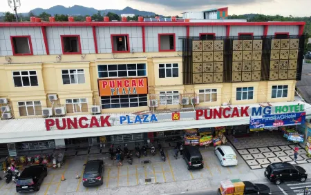 Puncak MG Hotel Отели в г. Semabung Lama