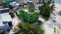 Iris Beach Residence Hotels near Cocoa Corner Dive Site