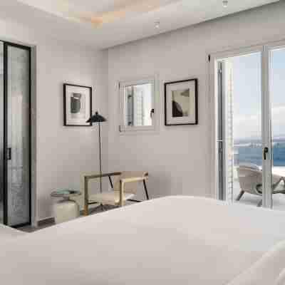 Deos Mykonos - A Myconian Collection Hotel Rooms