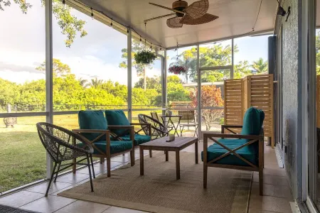 Quintessential FL Home Bursting with Color