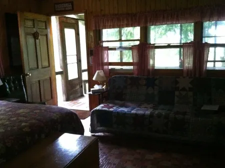 Secluded Cabin Nestled In The Trees Overlooking Fishing & Canoe Pond