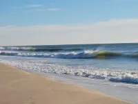Steps to the beach!  Relax and Enjoy!