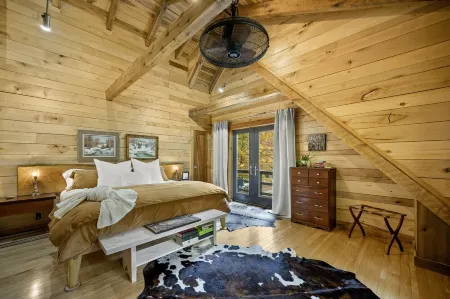 Artisan Log Haven: 40-Acre Forest Sanctuary