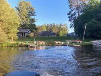 Clean cottage on the Eagle River Chain, dock, firewood, edge of town