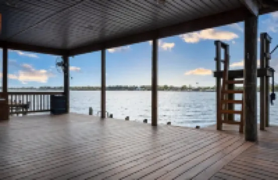 Screened porch and private pier on False River