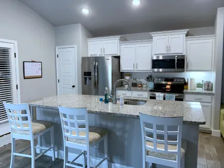 MODERN HOME - firepit & fenced in backyard!