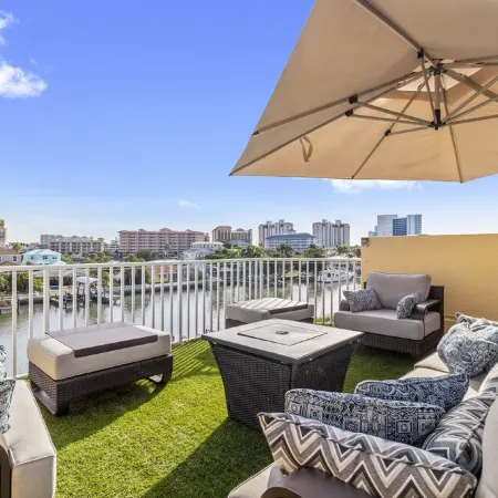 Luxury waterfront townhome, 5 min to beach, pool, fully stocked, & rooftop deck!