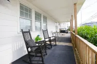 Classic Beach Cottage with front porch view of water
