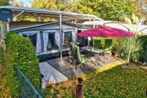 Chic caravan with awning on the Baltic Sea in Dierhagen