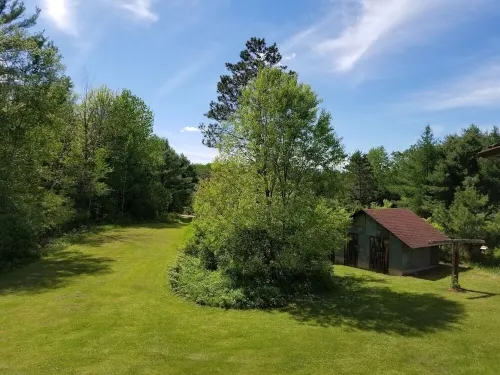 Log Cabin on 40 acres with a private lake