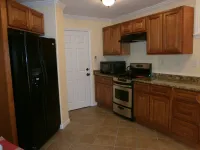 Private Entrance with off street Carport Parking!