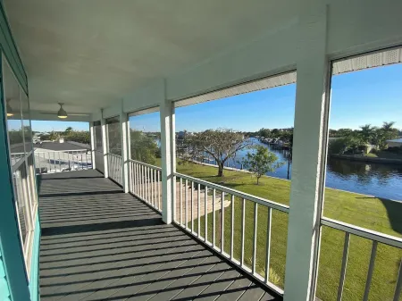 Raised home right on the Caloosahatchee River. Come enjoy the water and weather