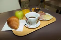 B&B HOTEL Aurillac Le Lioran - Desayuno