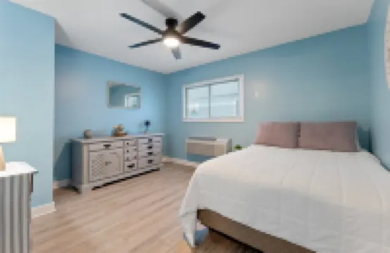 Heated Pools and Outdoor Relaxation Patio - Charming Coastal Escape