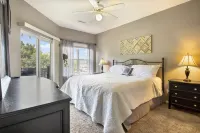 Access to Pools and Wet Bar Retreat - Charming Waterfront Haven