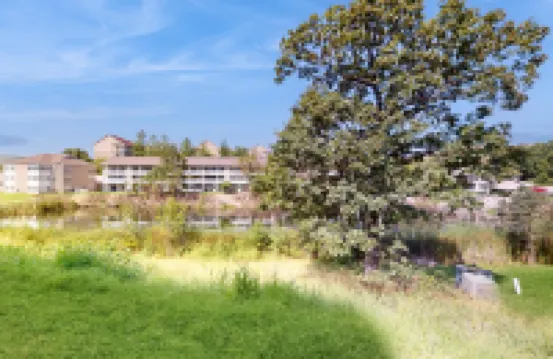 Single-level condo with screened patio & pond views