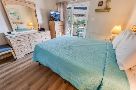 Resort View Balcony and Outdoor Pool - Beautiful Coastal Haven