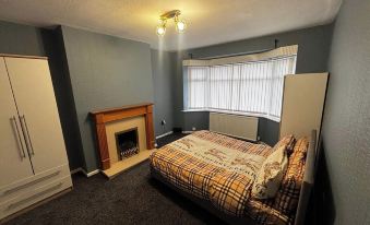 HouseSleeps9-Fireplace-Garden-Bbq-Tv