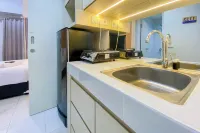 Nice And Cozy Studio At Amartha View Apartment