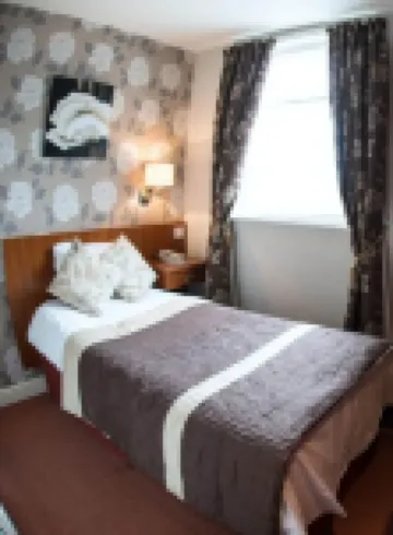 Thomas James Hotel Отели в г. 