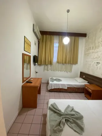 El Latino Otel Отели рядом с достопримечательностью «Çekirdeksiz Mandalin Camping Kemer Antalya Çadır Karavan Kamp Alanı»