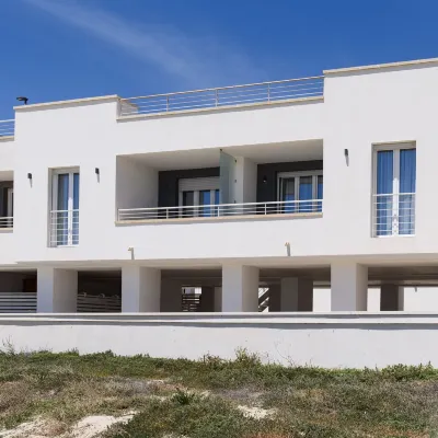 Hotiday Apartments Torre Lapillo Hotels near Orange Sun