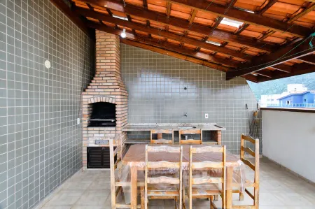 Fabiano Ubatuba Отели рядом с достопримечательностью «Ubatuba Bus Station»