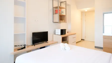 Cozy Stay Studio Connected with Mall at Supermall Mansion Apartment