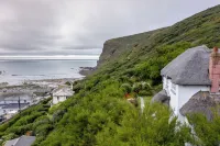 THATCHWAYS - Stunning traditional cottage overlooking the beach