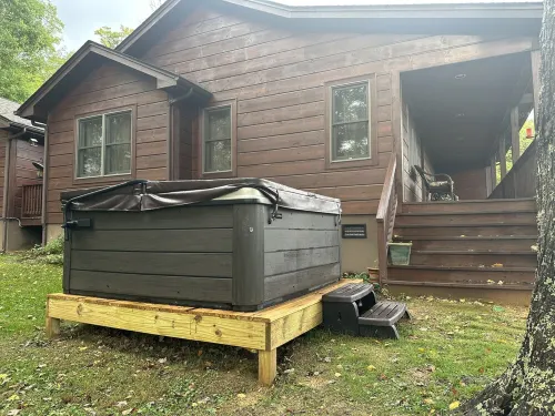 Cabin on topof the mountain great views hot tub game room and more!